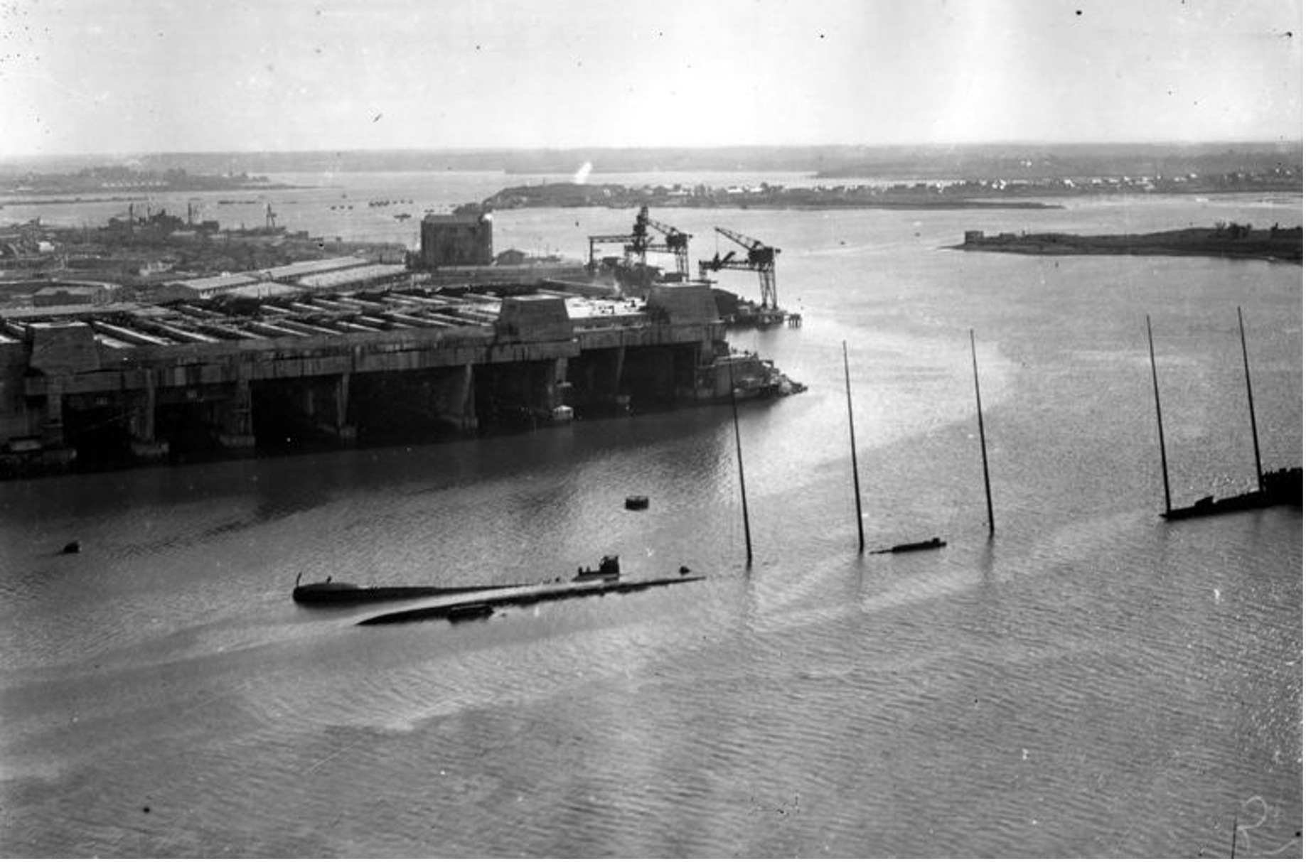 Massive reinforced-concrete submarine pens constructed during the Second World War to shelter and service German U-boats within the Atlantic defence system.